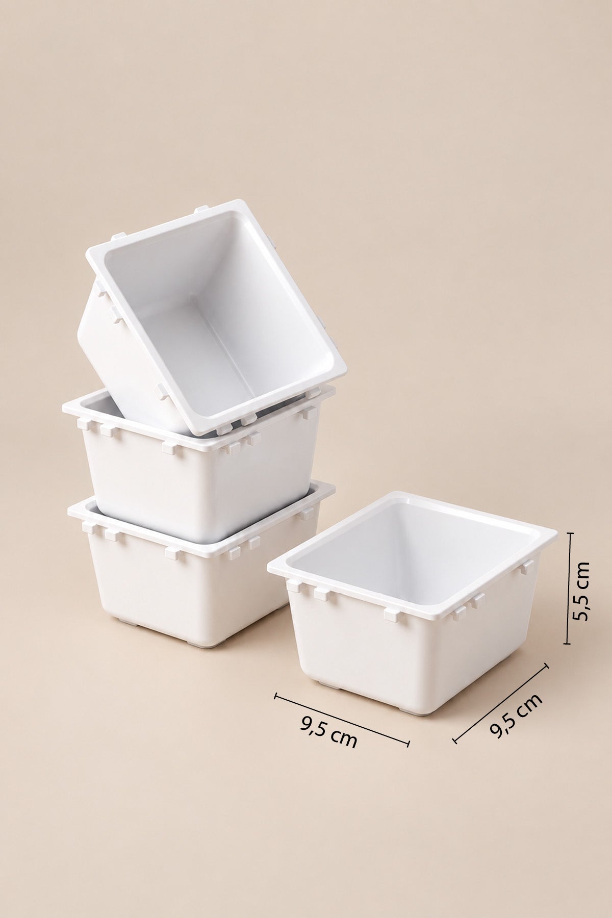 9,5 x 9,5 x 5,5 cm ölçüleri işaretlenmiş beyaz modüler çekmece düzenleyici kutular
