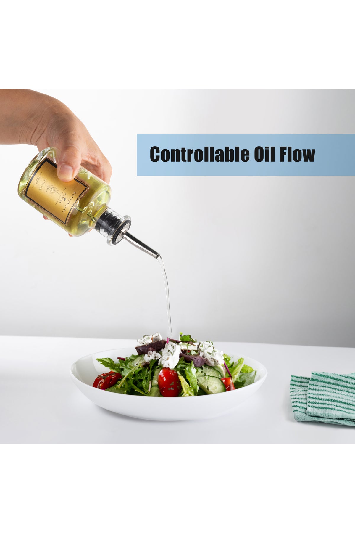 Controllable Oil Flow yazılı görsel: şeffaf yağdanlıktan salataya kontrollü akış