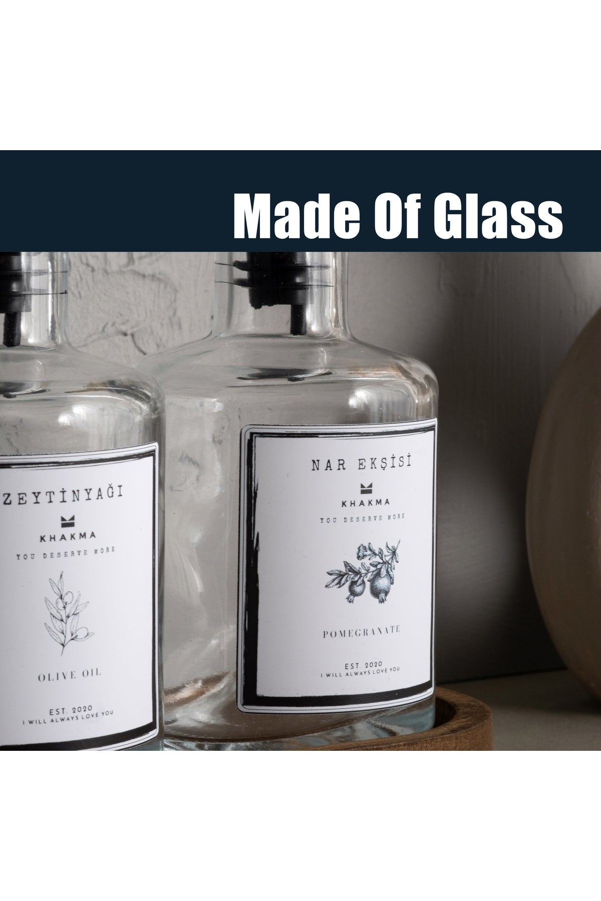 Cam gövdeli zeytinyağı ve nar ekşisi şişeleri, made of glass yazılı görsel