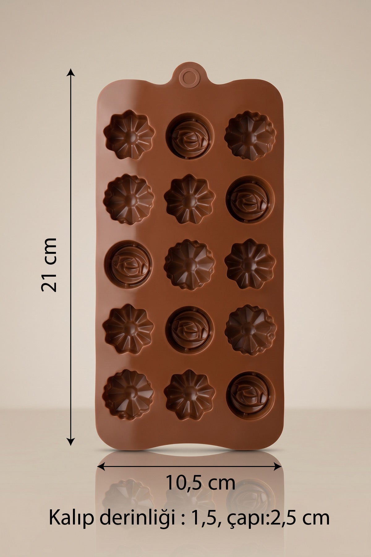 Silikon çikolata kalıbı ölçüleri: 21 x 10,5 cm, göz çapı 2,5 cm, derinlik 1,5 cm